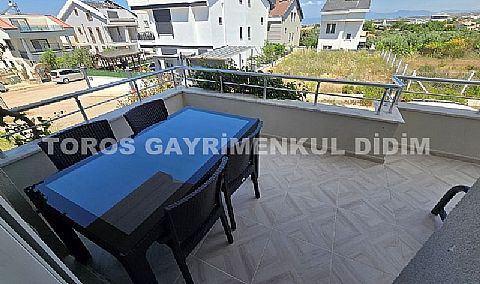 Didim Hisar Mahallesi'nde Yaz-Kış Oturuma Uygun, 95 m² Genişliğinde Kısmi Ayrı Mutfaklı satılık 2+1
