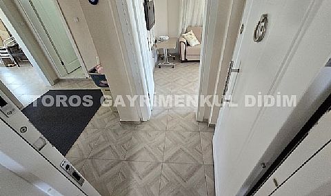 Didim Hisar Mahallesi'nde Yaz-Kış Oturuma Uygun, 95 m² Genişliğinde Kısmi Ayrı Mutfaklı satılık 2+1
