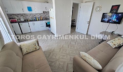 Didim Hisar Mahallesi'nde Yaz-Kış Oturuma Uygun, 95 m² Genişliğinde Kısmi Ayrı Mutfaklı satılık 2+1