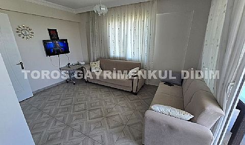 Didim Hisar Mahallesi'nde Yaz-Kış Oturuma Uygun, 95 m² Genişliğinde Kısmi Ayrı Mutfaklı satılık 2+1