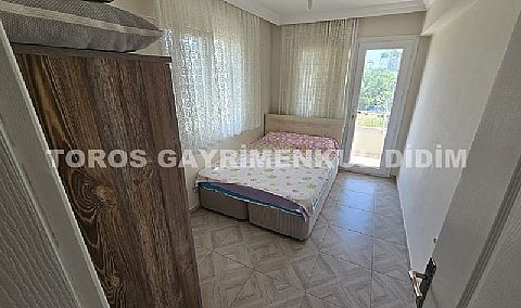 Didim Hisar Mahallesi'nde Yaz-Kış Oturuma Uygun, 95 m² Genişliğinde Kısmi Ayrı Mutfaklı satılık 2+1