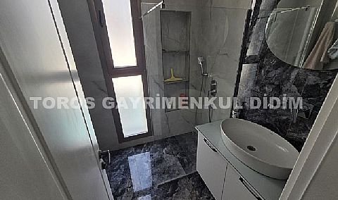 Didim hisarda 500 m2 arsa üzerine kurulu sıfır eşyalı satılık villa