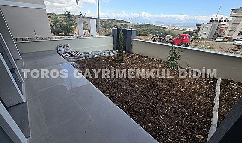 Didim hisarda satılık bahçeli giriş kat ayrı mutfaklı daire