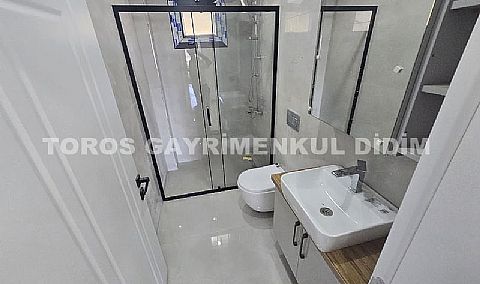 Didim hisarda satılık bahçeli giriş kat ayrı mutfaklı daire