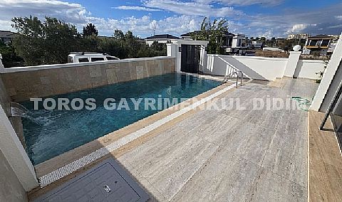 Didim mavişehirde plaja 700 mt mesafede satılık havuzlu villa