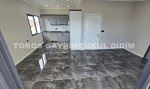 Didim merkez hisar mahallesinde asansörlü binada satılık dubleks daire