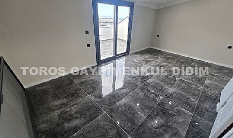 Didim merkez hisar mahallesinde asansörlü binada satılık dubleks daire