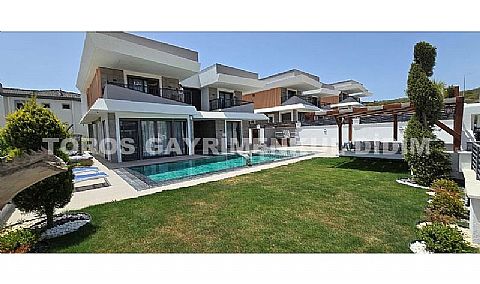 Didimde 500 m2 arsa içinde Elektriğini Kendi üreten, Havuza kışında Girilebilen 5+1 yerden Isıtmalı Villa
