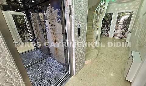 Didim'de Havuzlu Sitede Lüks ve Eşyalı 2+1 Satılık Daire