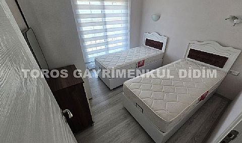 Didim'de Havuzlu Sitede Lüks ve Eşyalı 2+1 Satılık Daire