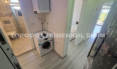 Didim'de Havuzlu Sitede Lüks ve Eşyalı 2+1 Satılık Daire