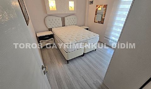 Didim'de Havuzlu Sitede Lüks ve Eşyalı 2+1 Satılık Daire