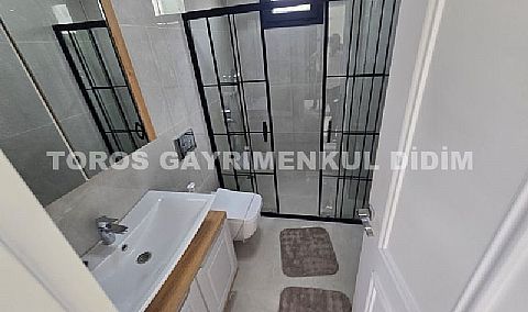 DİDİM’DE LÜKS VE KONFORUN YENİ ADRESİ: SIFIR ÖZEL TASARIM EŞYALI, HAVUZLU MÜSTAKİL SATILIK VİLLA